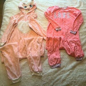 Set of two girls pjs pink with white polka dots.